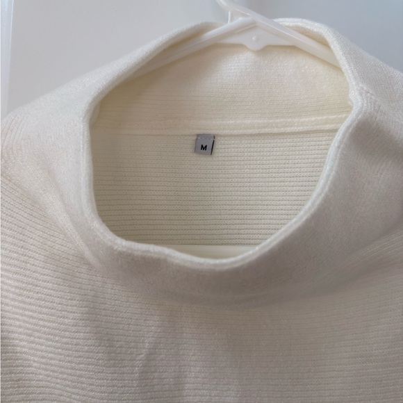 Elegant Cream Turtleneck Sweater - Picture 2 of 3